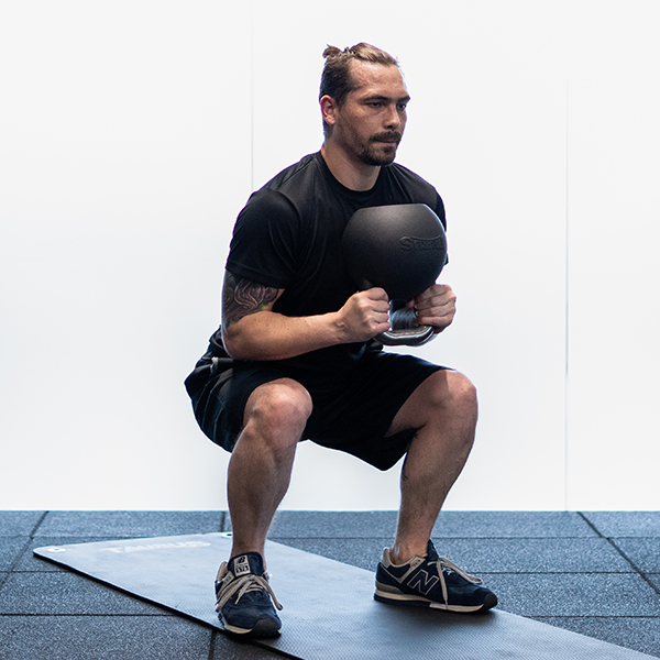Chris_Kettlebell_Goblet_Squat_600x600px The Marathon Checklist: Preparing to Go the Extra Mile