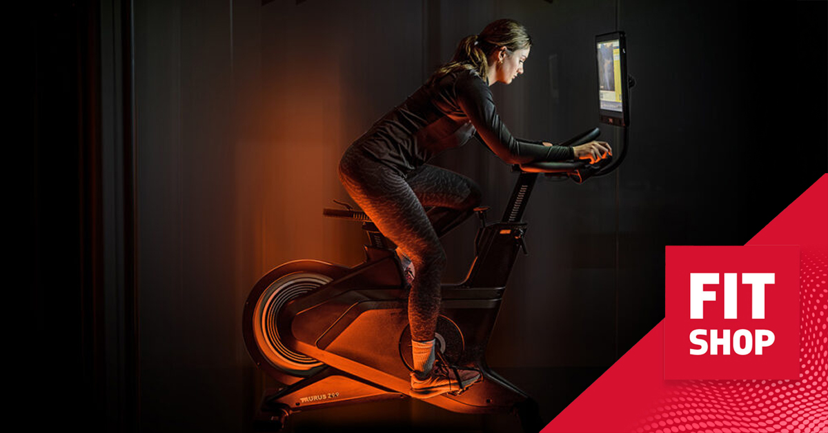 Model working out on the Taurus Z9.9 Pro exercise bike